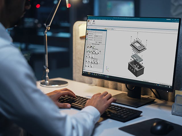 An employee reviews a 3D CAD model using the free JT2Go viewer application.